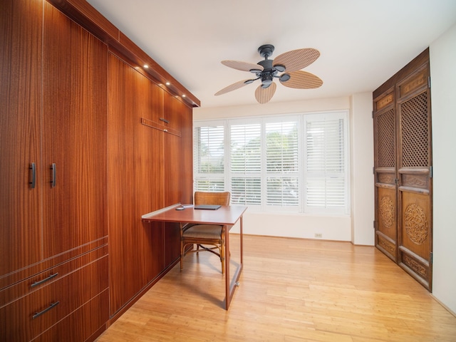 office space with ceiling fan and light hardwood / wood-style flooring