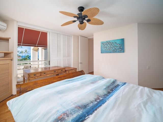 bedroom with light wood-type flooring, ceiling fan, and a closet