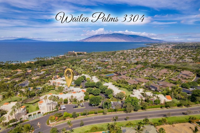 bird's eye view featuring a water and mountain view