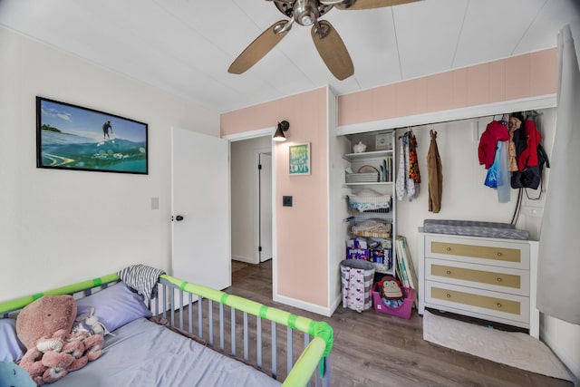 5131 Hanawai St Unit F, Lahaina, HI 96761 - bedroom with wood finished floors and ceiling fan