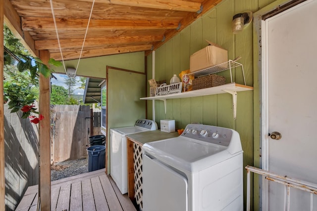 5131 Hanawai St Unit F, Lahaina, HI 96761 - laundry area with independent washer and dryer, wood-type flooring, wood ceiling, and wood walls