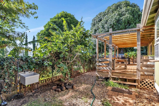 5131 Hanawai St Unit F, Lahaina, HI 96761 - view of yard featuring a deck, a pergola, and a sink