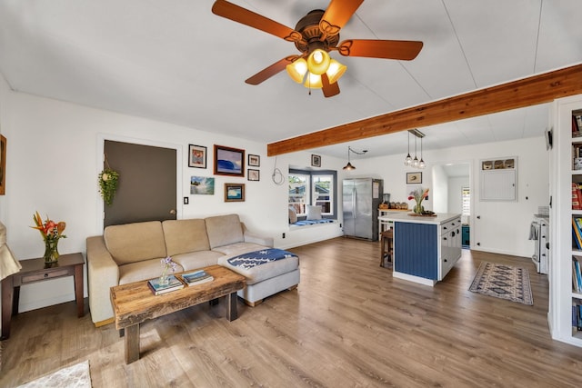 5131 Hanawai St Unit F, Lahaina, HI 96761 - living area featuring ceiling fan, wood finished floors, beamed ceiling, and baseboards