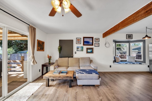 5131 Hanawai St Unit F, Lahaina, HI 96761 - living room featuring plenty of natural light, wood finished floors, baseboards, and beam ceiling