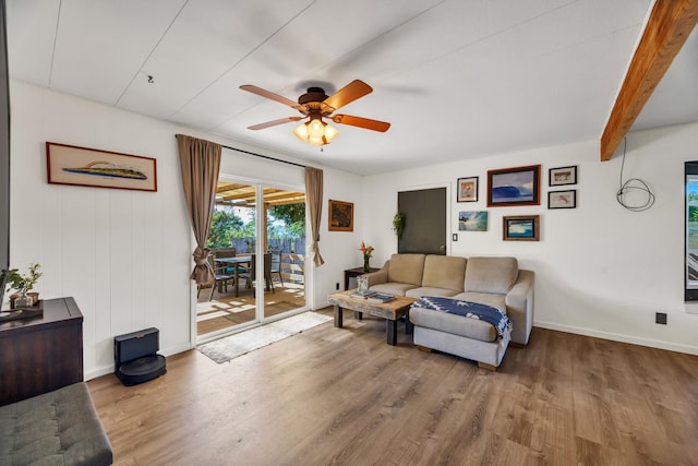 5131 Hanawai St Unit F, Lahaina, HI 96761 - living room with wood finished floors, a ceiling fan, and baseboards