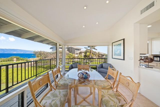 balcony featuring a water view