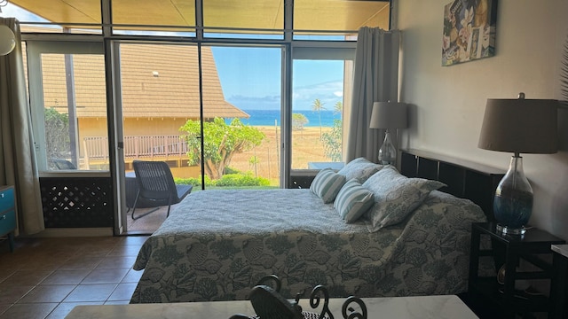 tiled bedroom featuring multiple windows