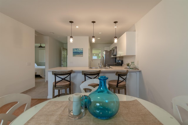 43 Polohina Ln Unit 13-8, Lahaina, HI 96761 - dining area with light wood-style flooring and recessed lighting
