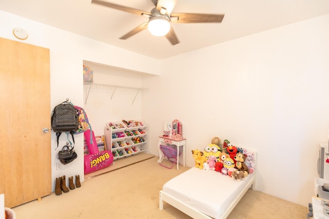 recreation room featuring ceiling fan and carpet