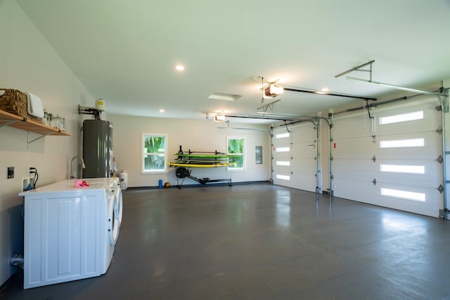 garage with recessed lighting, gas water heater, a garage door opener, and electric panel