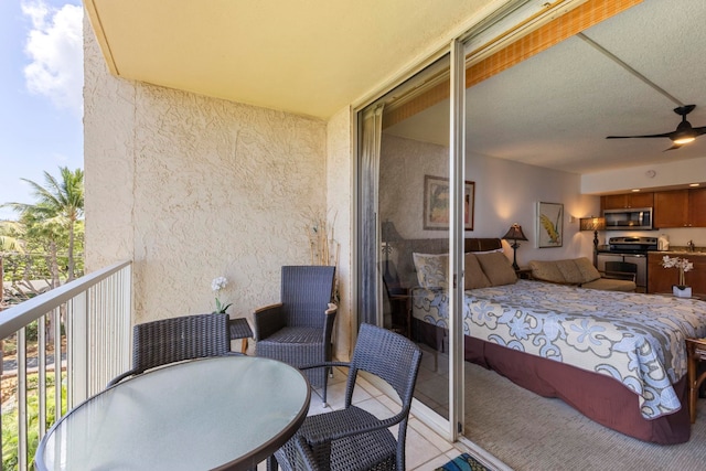4365 Lower Honoapiilani Rd Unit 603, Lahaina, HI 96761 - balcony with a ceiling fan and outdoor dining area