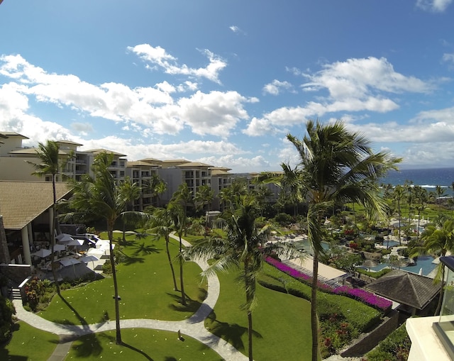 surrounding community featuring a water view