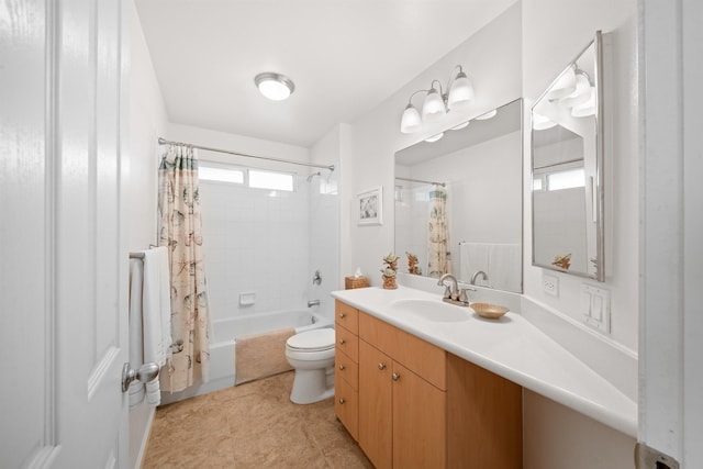 bathroom featuring toilet, shower / tub combo with curtain, vanity, and tile patterned flooring