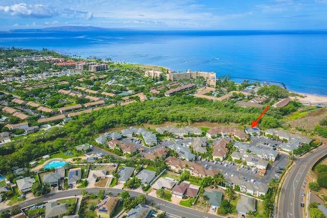 bird's eye view featuring a residential view and a water view