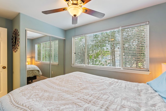 bedroom with a closet and a ceiling fan