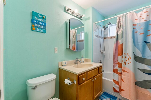 bathroom featuring shower / bathtub combination with curtain, toilet, and vanity