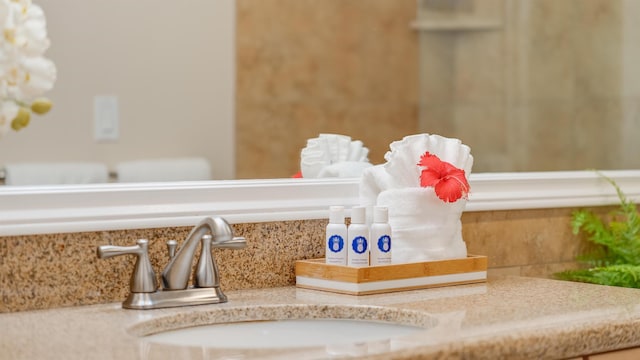 details with decorative backsplash and sink