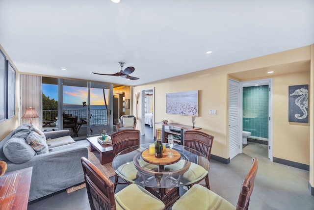 dining room with recessed lighting, baseboards, and a ceiling fan