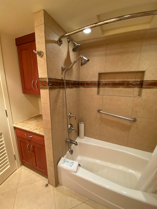 bathroom with tile patterned flooring and tiled shower / bath combo