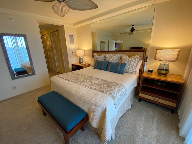 bedroom featuring ceiling fan and carpet floors