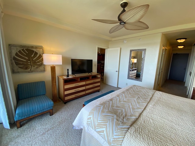 carpeted bedroom featuring ceiling fan