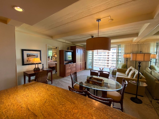 view of carpeted dining area