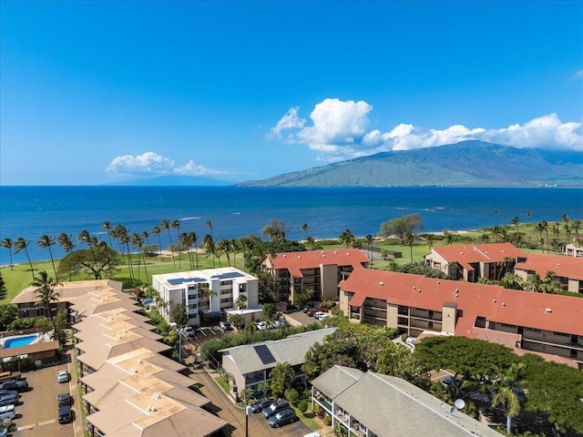 bird's eye view featuring a water and mountain view