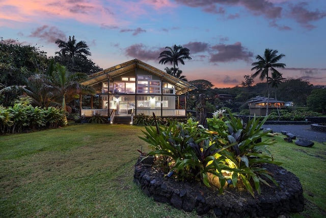 140 Waikoloa Rd, Hana, HI 96713 - back of property featuring a yard and a deck