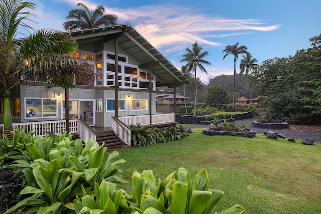 140 Waikoloa Rd, Hana, HI 96713 - back of house at dusk with a yard and stairway