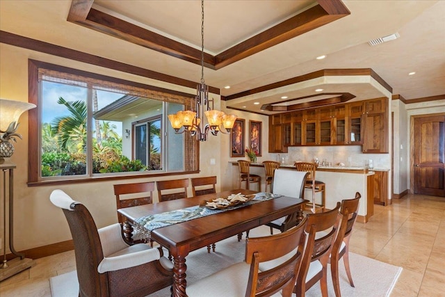 85 Lau Awa Pl, Lahaina, HI 96761 - dining space with a chandelier, baseboards, ornamental molding, recessed lighting, and a tray ceiling