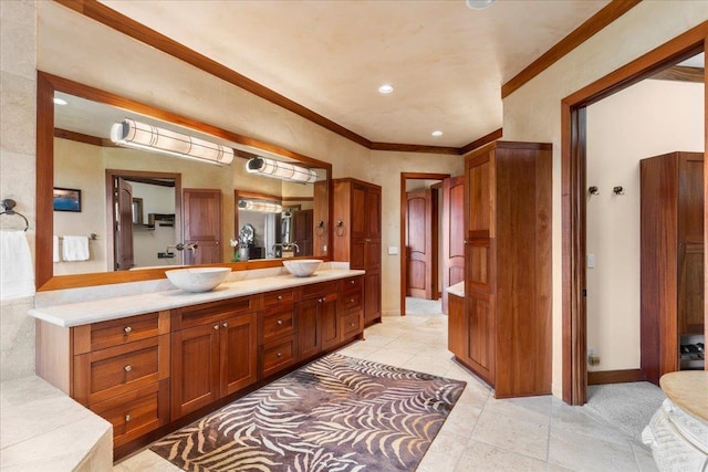 85 Lau Awa Pl, Lahaina, HI 96761 - bathroom featuring crown molding, double vanity, baseboards, tile patterned floors, and recessed lighting