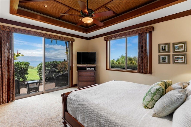 85 Lau Awa Pl, Lahaina, HI 96761 - carpeted bedroom featuring a tray ceiling, access to exterior, multiple windows, and ceiling fan