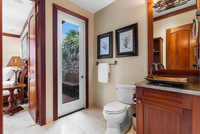 85 Lau Awa Pl, Lahaina, HI 96761 - bathroom with vanity, toilet, tile patterned flooring, and baseboards