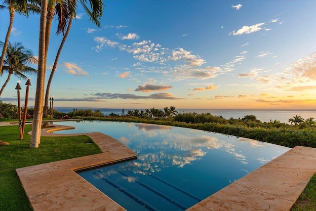 85 Lau Awa Pl, Lahaina, HI 96761 - pool at dusk with a water view and a yard