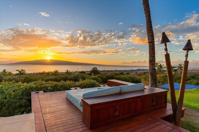 85 Lau Awa Pl, Lahaina, HI 96761 - deck at dusk featuring a covered hot tub and a water view