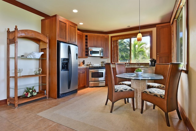 85 Lau Awa Pl, Lahaina, HI 96761 - kitchen featuring stainless steel appliances, brown cabinetry, decorative light fixtures, open shelves, and recessed lighting