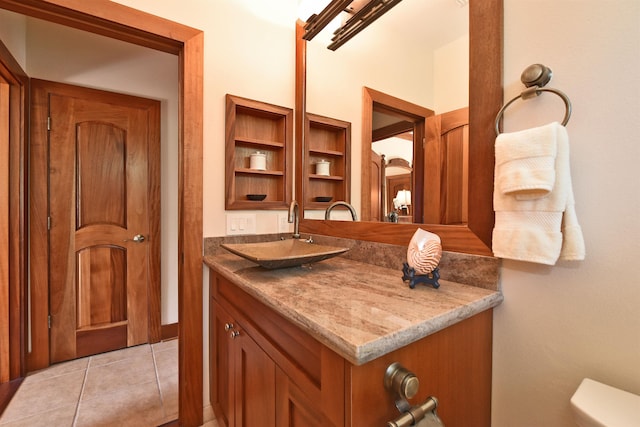 85 Lau Awa Pl, Lahaina, HI 96761 - half bathroom with vanity, toilet, and tile patterned flooring