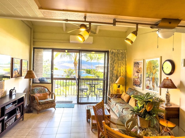 living room with ceiling fan, light tile patterned flooring, and an AC wall unit