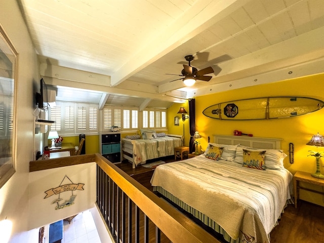 bedroom featuring beamed ceiling, ceiling fan, and wood-type flooring