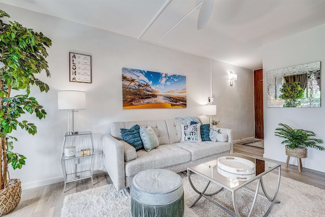 1002 S Kihei Rd Unit 205, Kihei, HI 96753 - living room with wood finished floors and baseboards