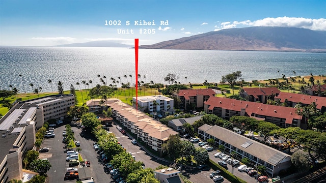 1002 S Kihei Rd Unit 205, Kihei, HI 96753 - drone / aerial view of a water and mountain view and apartment complex / building
