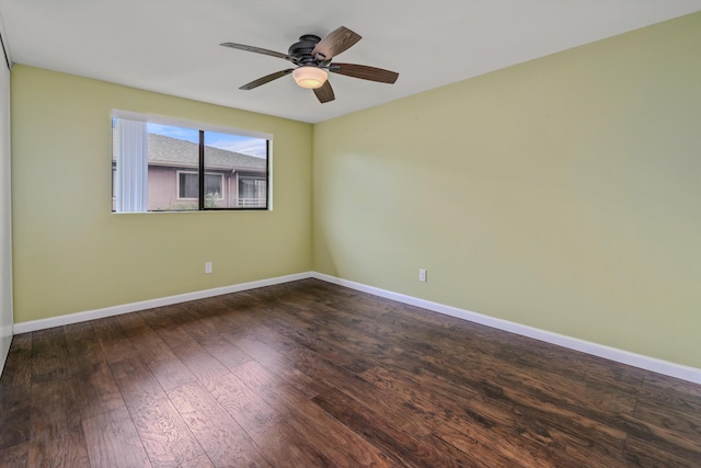 spare room featuring hardwood / wood-style flooring and ceiling fan