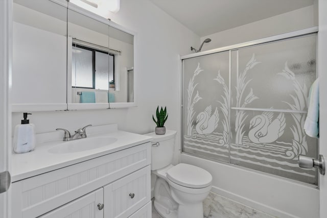 full bathroom featuring toilet, enclosed tub / shower combo, and vanity