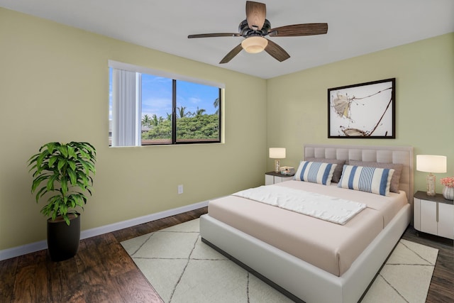 bedroom with ceiling fan and hardwood / wood-style flooring