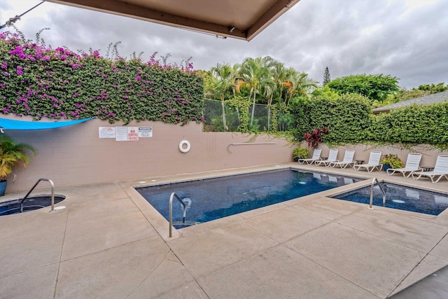 view of swimming pool featuring a patio