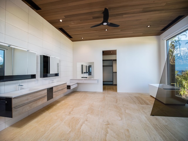 view of patio featuring ceiling fan