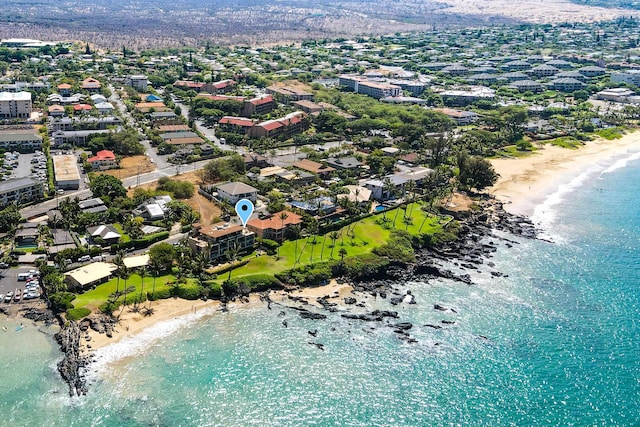 drone / aerial view with a view of the beach and a water view