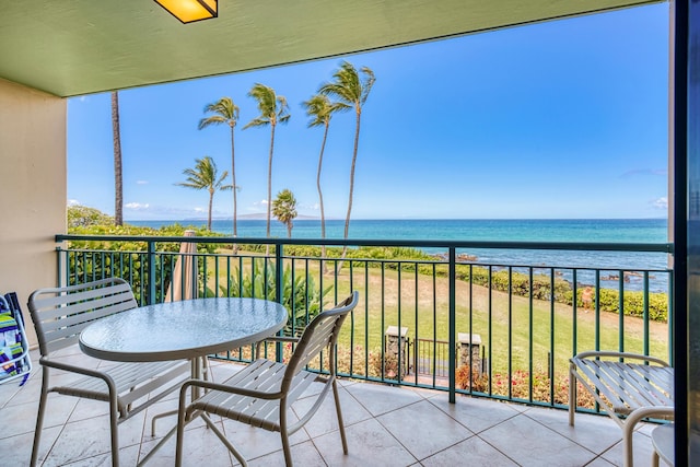 balcony featuring a water view