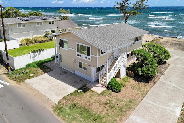 bird's eye view with a residential view and a water view