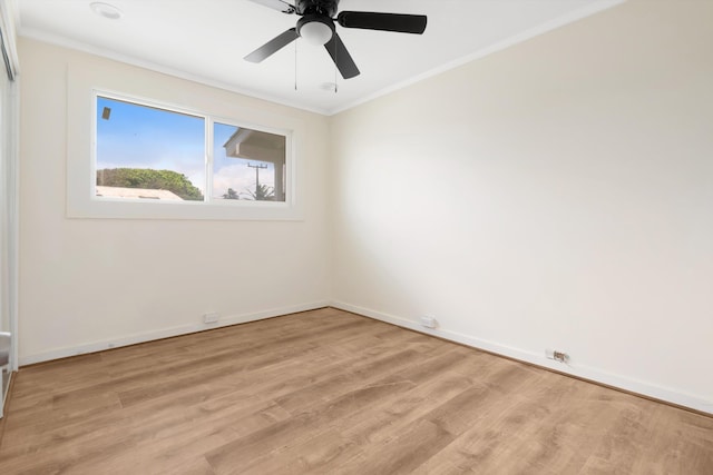 unfurnished room featuring baseboards, ornamental molding, ceiling fan, and light wood finished floors